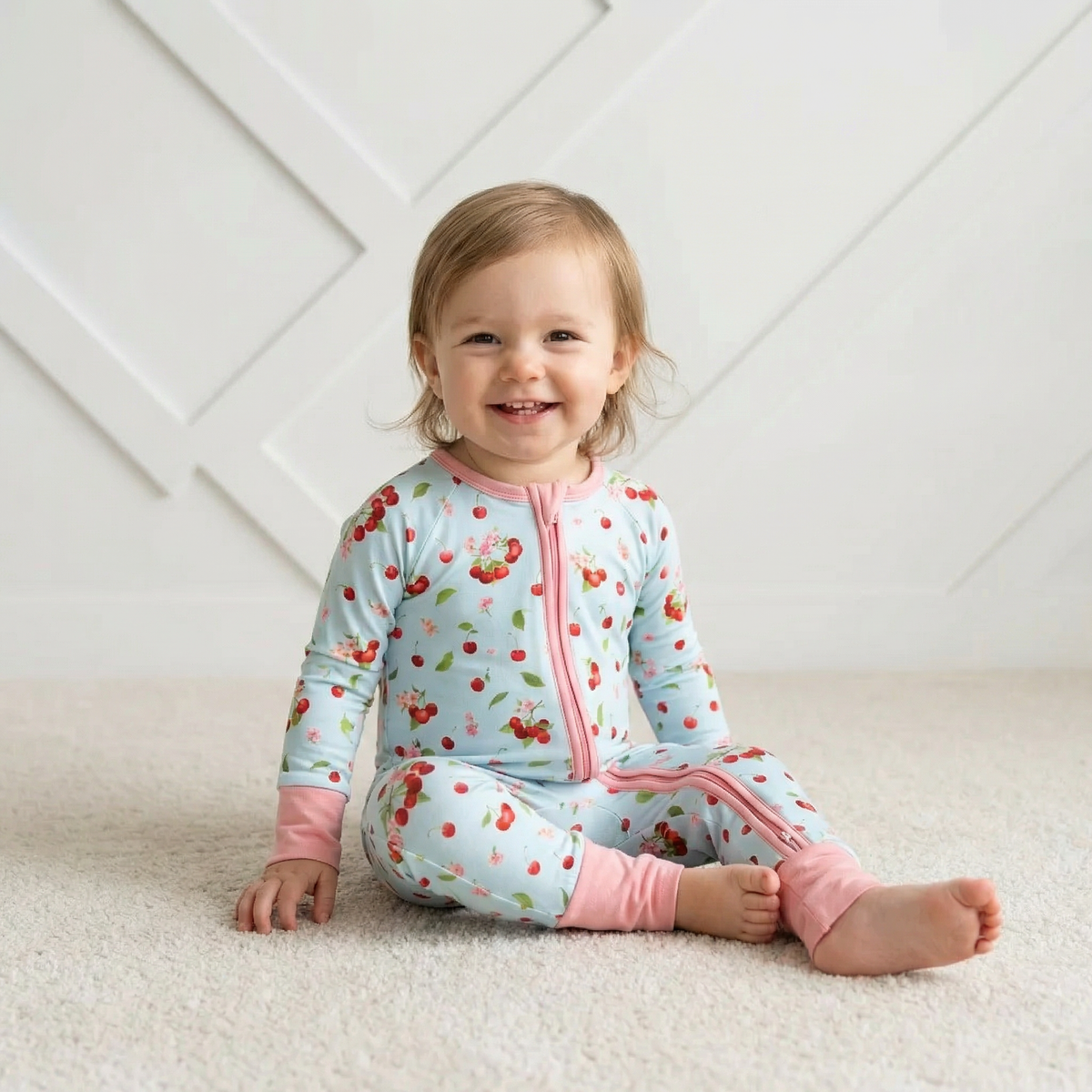 Baby convertible coverall in cherry kiss print with two-way zipper and convertible foot cuffs