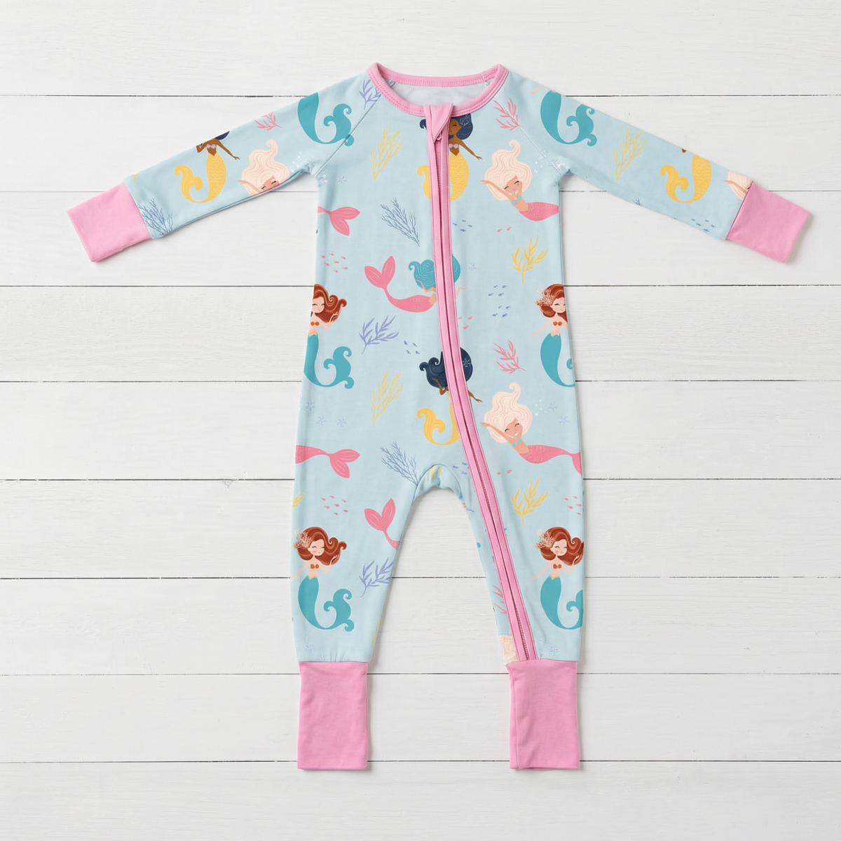 Baby convertible coverall in coral print with two-way zipper and convertible footed cuffs