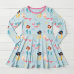 Long sleeve toddler twirl dress in coral with a full skirt, made from bamboo and spandex fabric