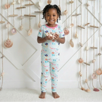 Two-piece pajama set with coral print short sleeve top and matching long pajama pants
