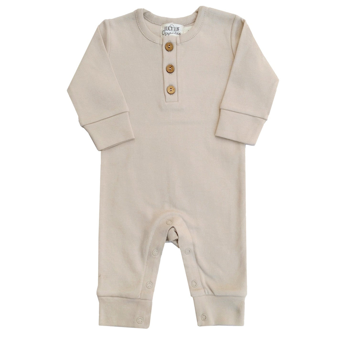 Baby wearing a soft, organic long sleeve cotton romper from LUCY LUE ORGANICS, gentle on skin.
