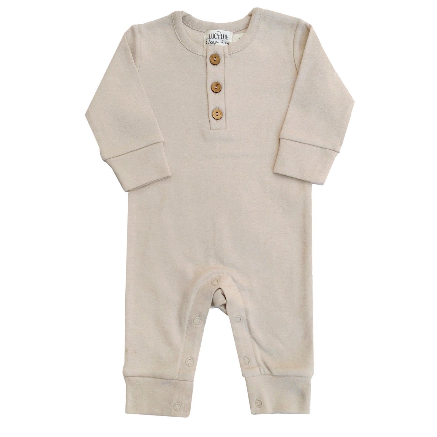 Baby wearing a soft, organic long sleeve cotton romper from LUCY LUE ORGANICS, gentle on skin.