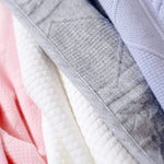 Goosewaddle® | Newborn Baby Blankets Toys Teethers Bibs & More Cozy Pink Knit Baby Blanket for Newborns with Softness