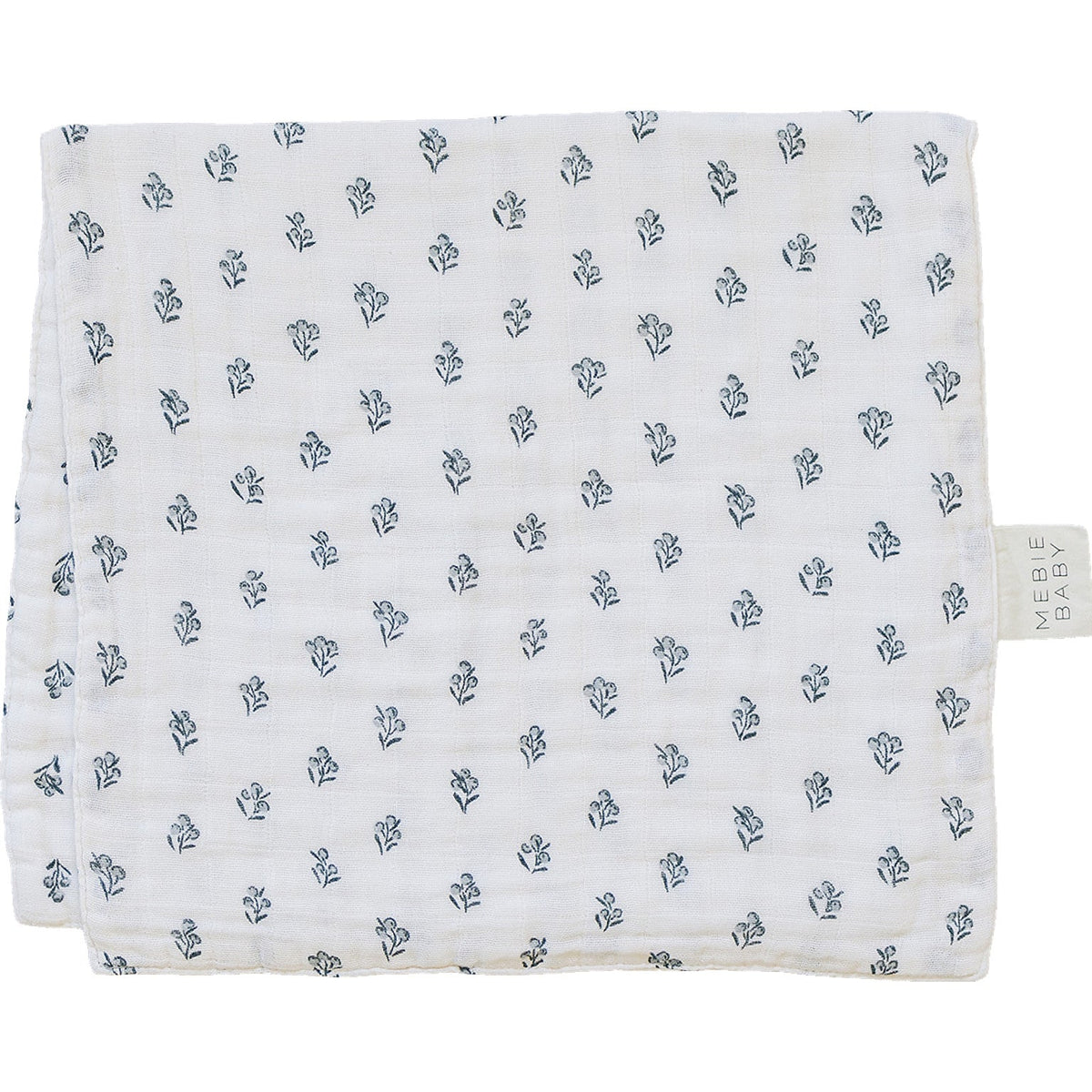 Muslin burp cloth in cream with a small berry print pattern, laid flat