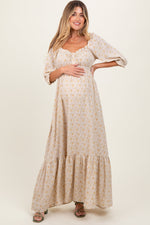 Model wearing a PinkBlush Cream Floral Sweetheart Neckline Maternity Maxi Dress, posing gracefully.