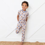 Short sleeve baby pajama set with brown and blue western cowboy boot print top and matching pants