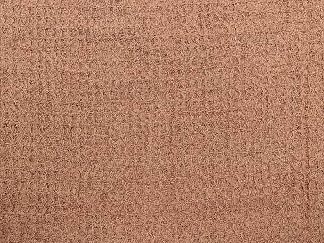 Crover 100% cotton waffle baby blanket for swaddling and stroller coverage.