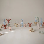 Mushie Daisy Silicone Suction Builder Toys Set of 18 Flexible Non-Toxic Fun for Motor Skills and Creativity -