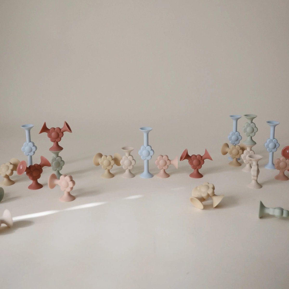 Mushie Daisy Silicone Suction Builder Toys Set of 18 Flexible Non-Toxic Fun for Motor Skills and Creativity -