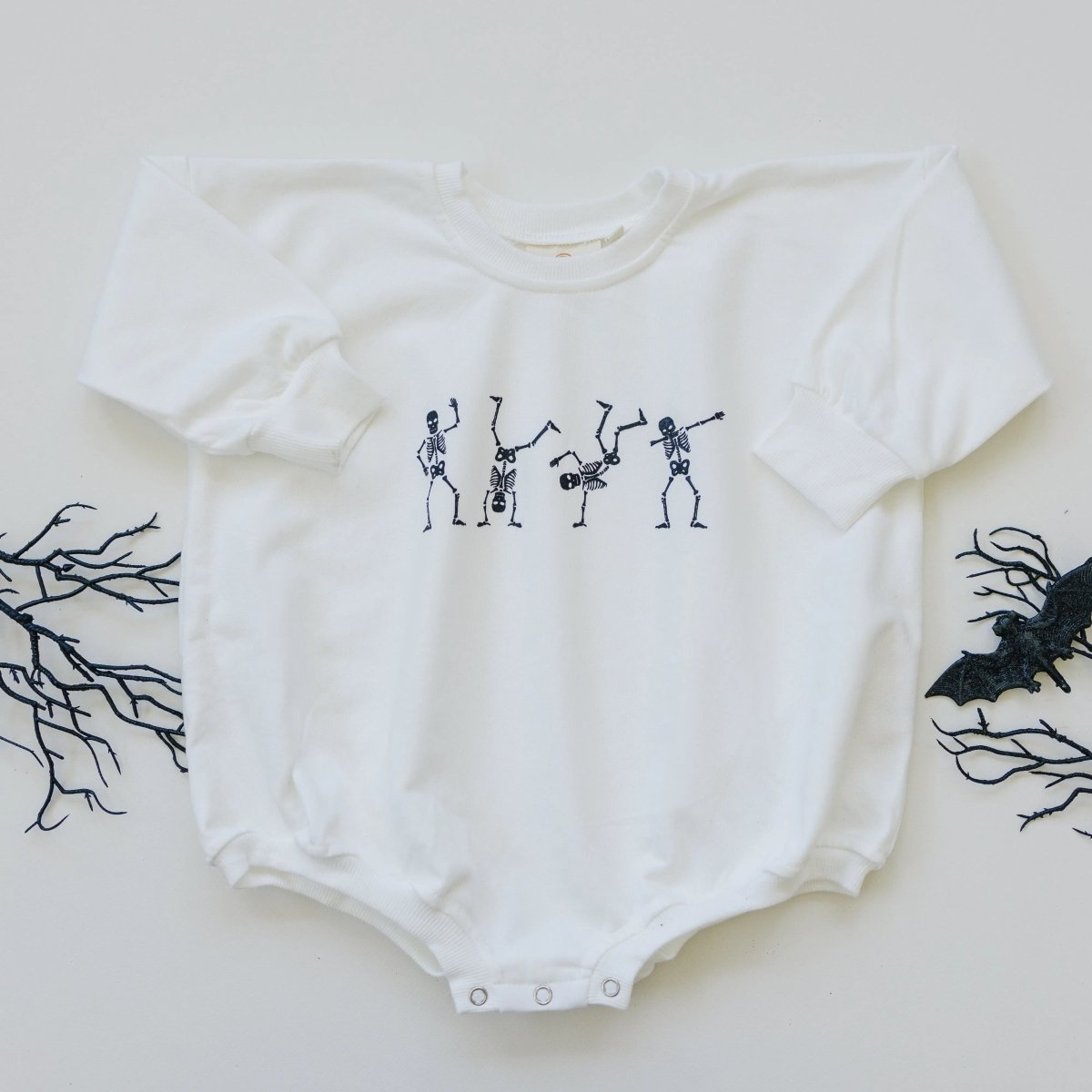 Little Joy Co. Dancing Skeletons Graphic Oversized Sweatshirt Romper White - Everetts Place Boutique - 