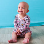 Bodysuit dress with a Dear Diary print, long sleeves, and snaps at the inseam