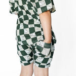 Harem shorts in a dino checks print with elastic drawstring waistband and side pockets