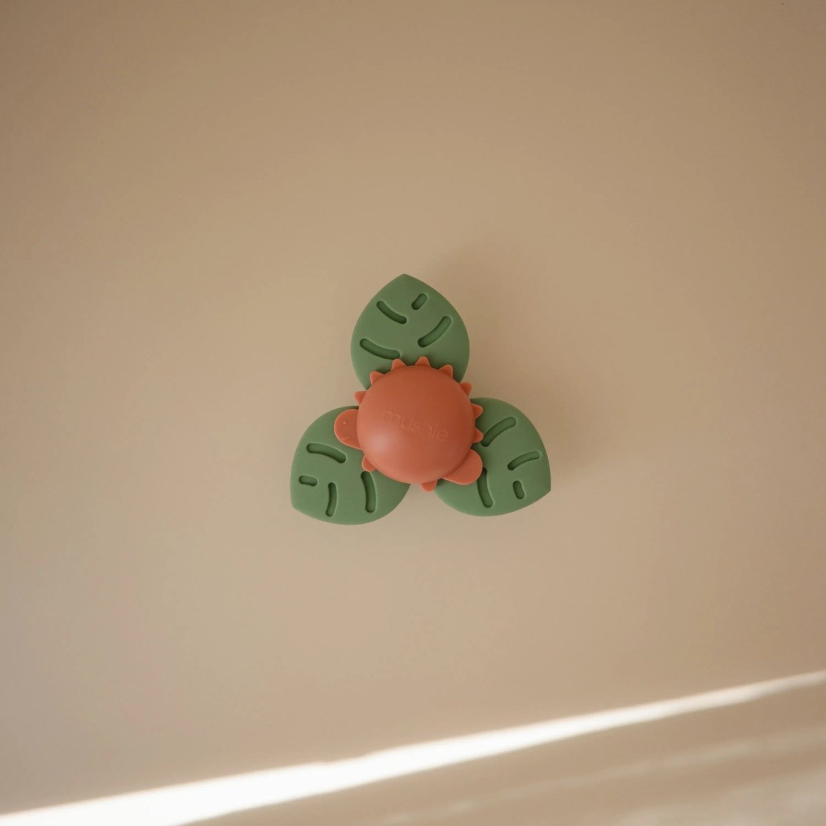 Mushie Dino Suction Spinner Toy for Kids with 100 Percent Food Grade Silicone Leaves - Everetts Place Boutique - 