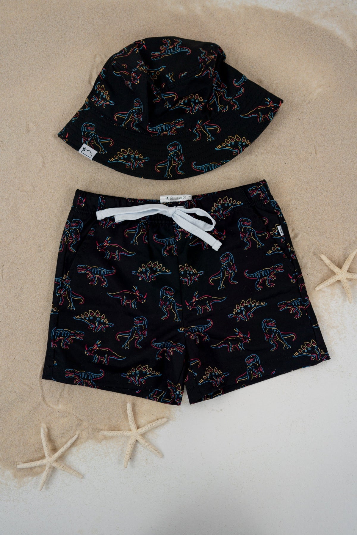 DREAM BIG LITTLE CO DINOSNORE DREAM SWIM TRUNKSEveretts Place