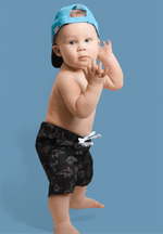 DREAM BIG LITTLE CO DINOSNORE DREAM SWIM TRUNKSEveretts Place