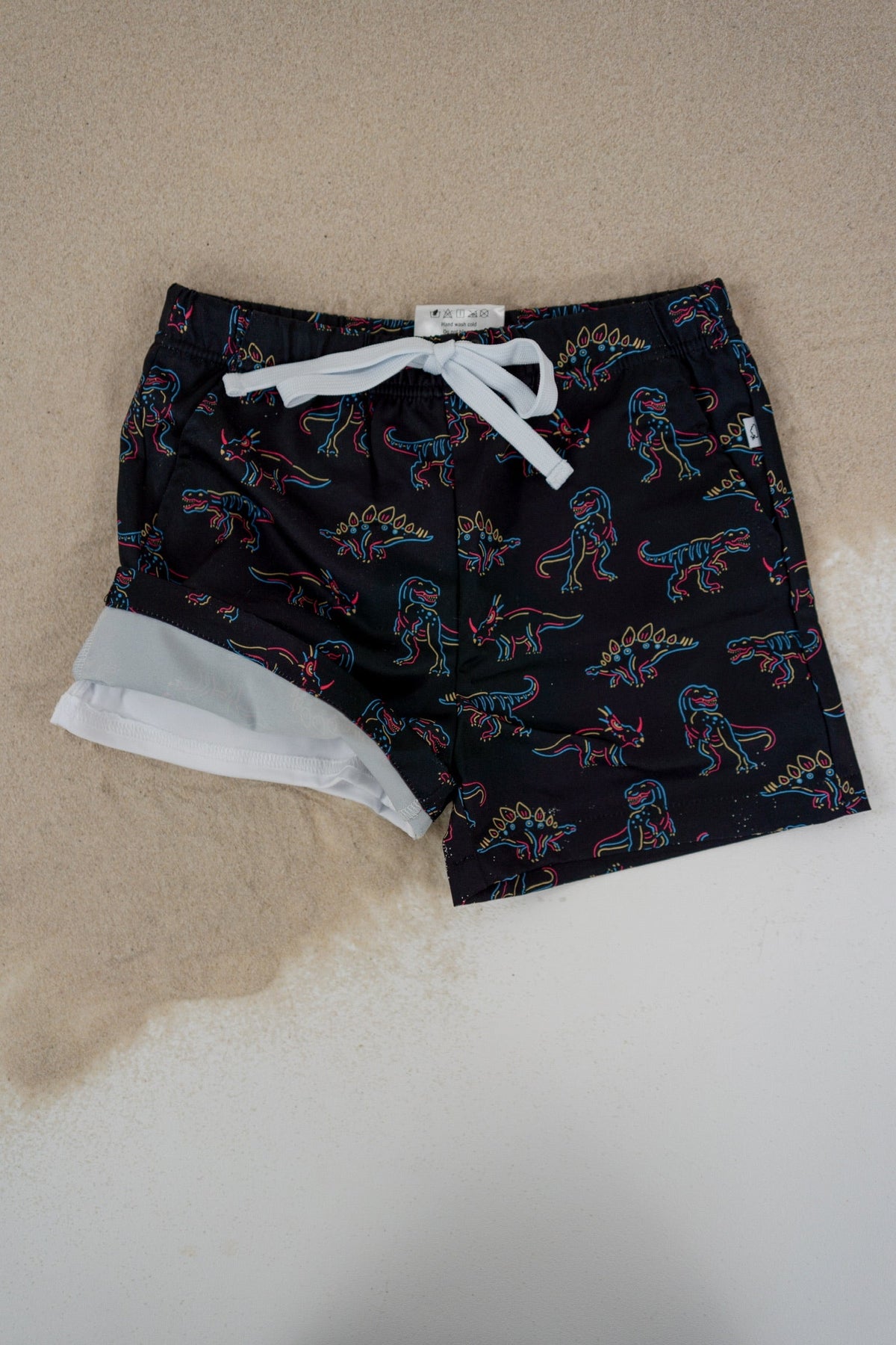 DREAM BIG LITTLE CO DINOSNORE DREAM SWIM TRUNKSEveretts Place