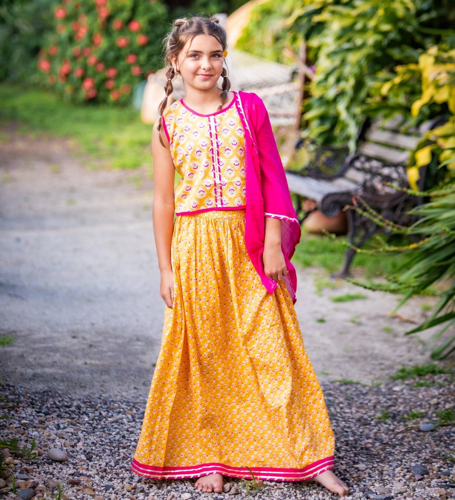 Baby lehenga set in bright orange and red cotton with an elastic waist and matching dupatta