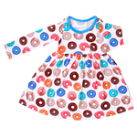Long sleeve baby twirl dress with a pink donut print and full twirl skirt
