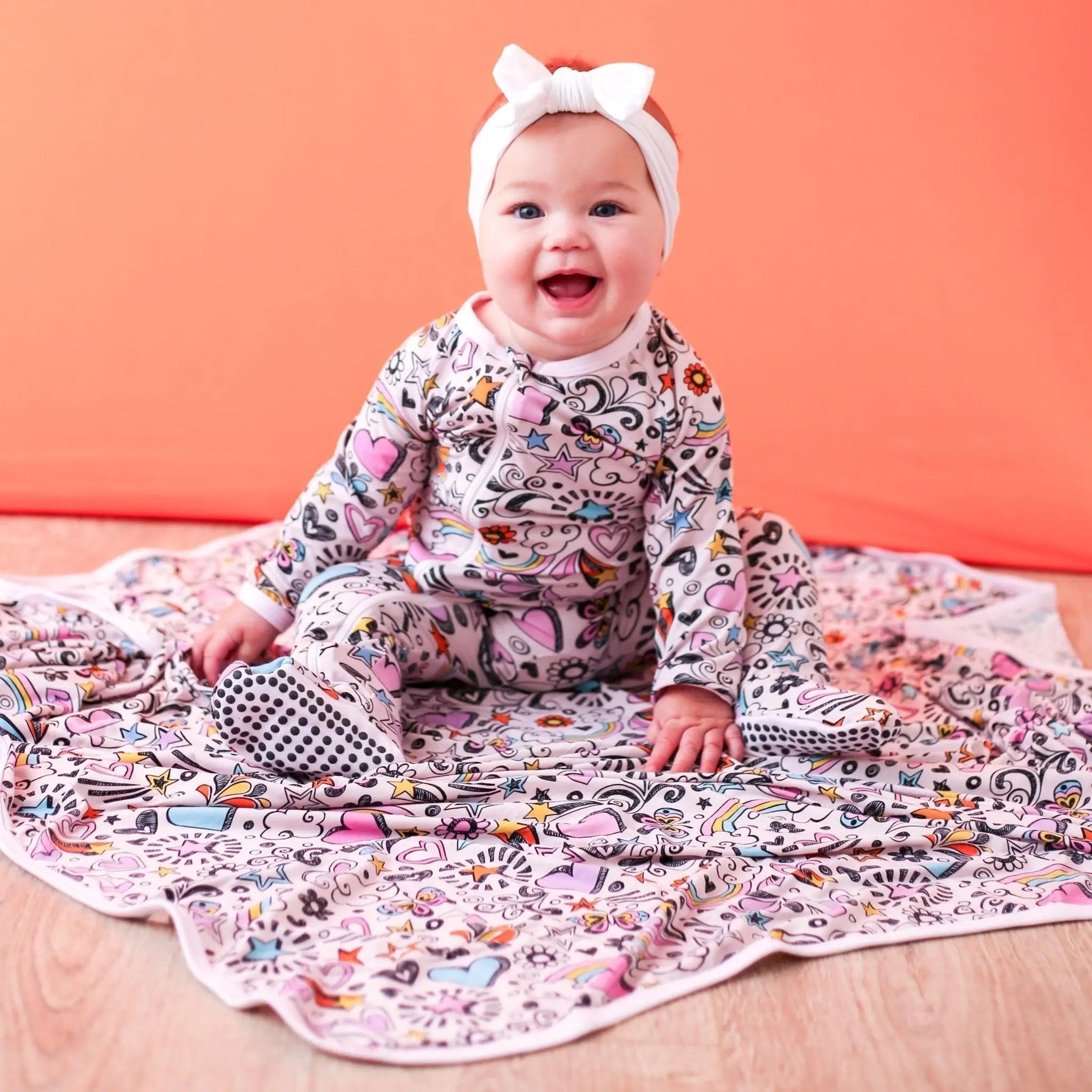 Doodle Days Swaddle - Baby & Toddler Clothing, Child, Happiness, Textile, Facial expression | Everetts Place
