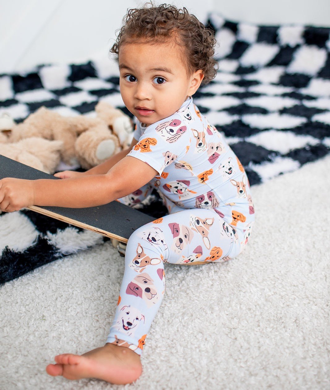 Two-piece short sleeve baby pajama set with a dreamy dog print top and matching pants