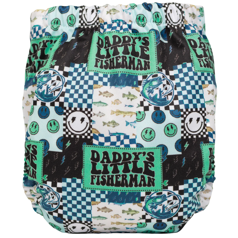 Tiny Tushies Newborn AIO Cloth Diaper with colorful "Daddy's Little Fisherman" print, designed for babies 5-20 lbs.
