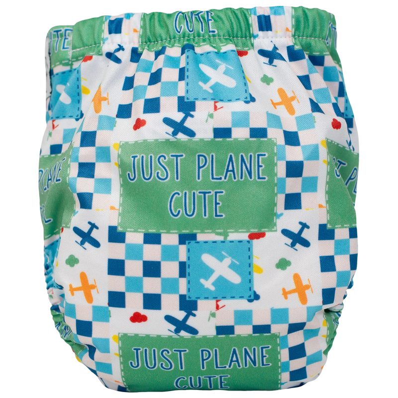 Tiny Tushies Newborn AIO Cloth Diaper with colorful airplane print.