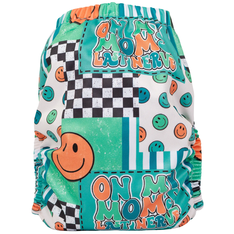 Slim Fit Pocket Cloth Diaper with colorful graphic design featuring smiley faces and checkered patterns.