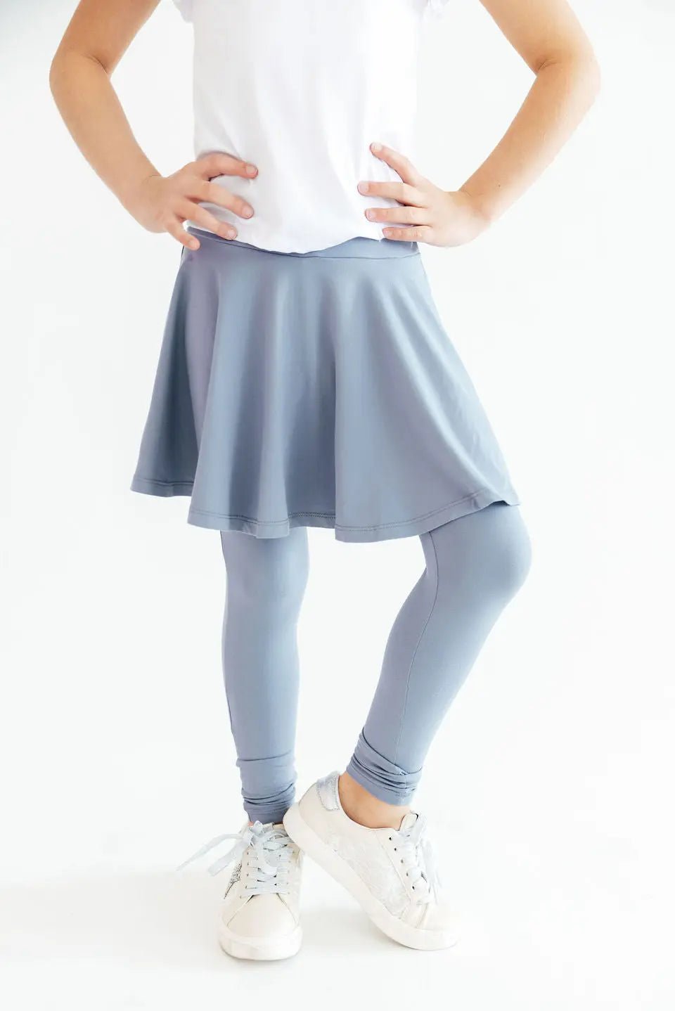 Dusty blue twirl skegging with attached skirt over full-length leggings for girls
