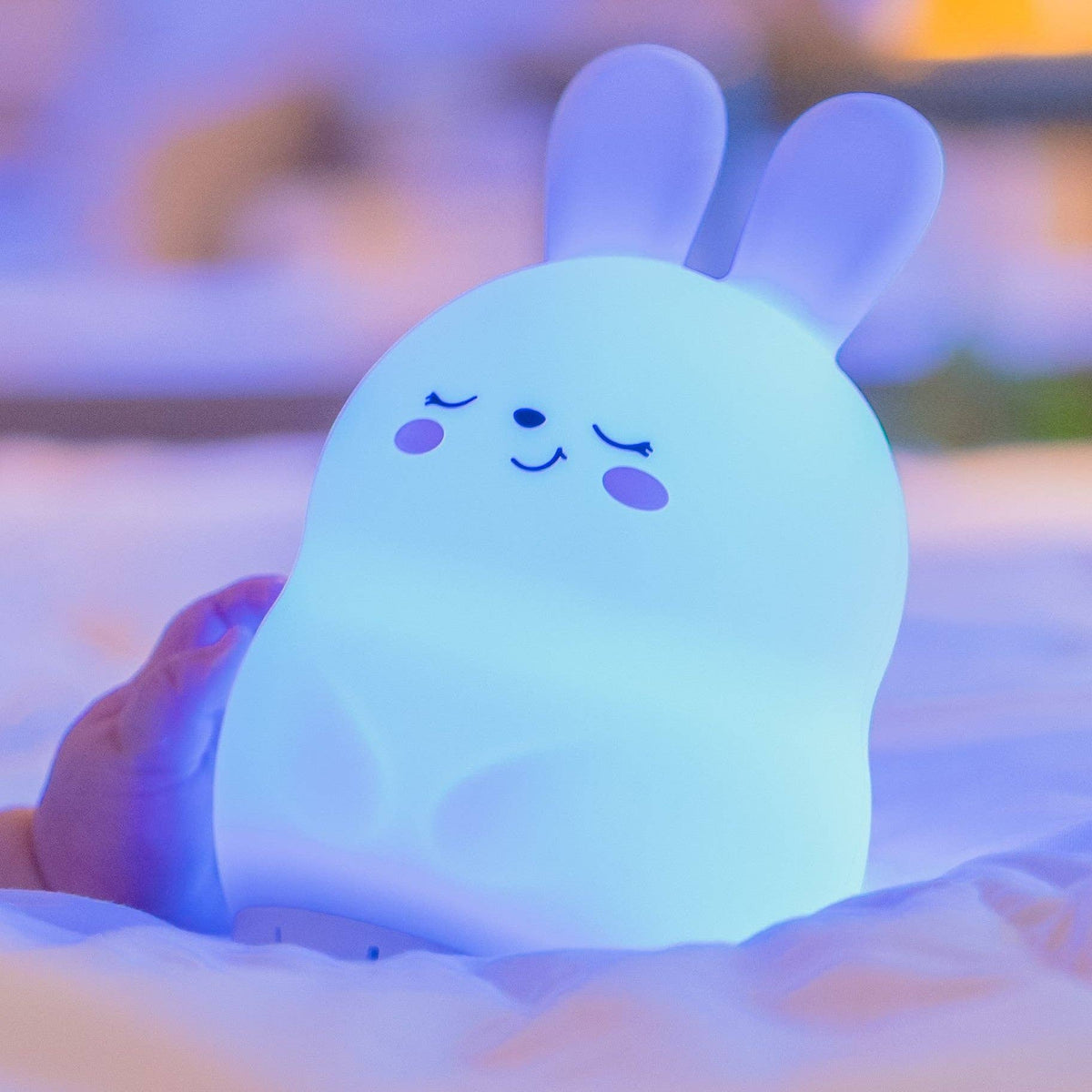 Sleeping Pal cordless bunny night lamp with soothing sounds for babies and kids.
