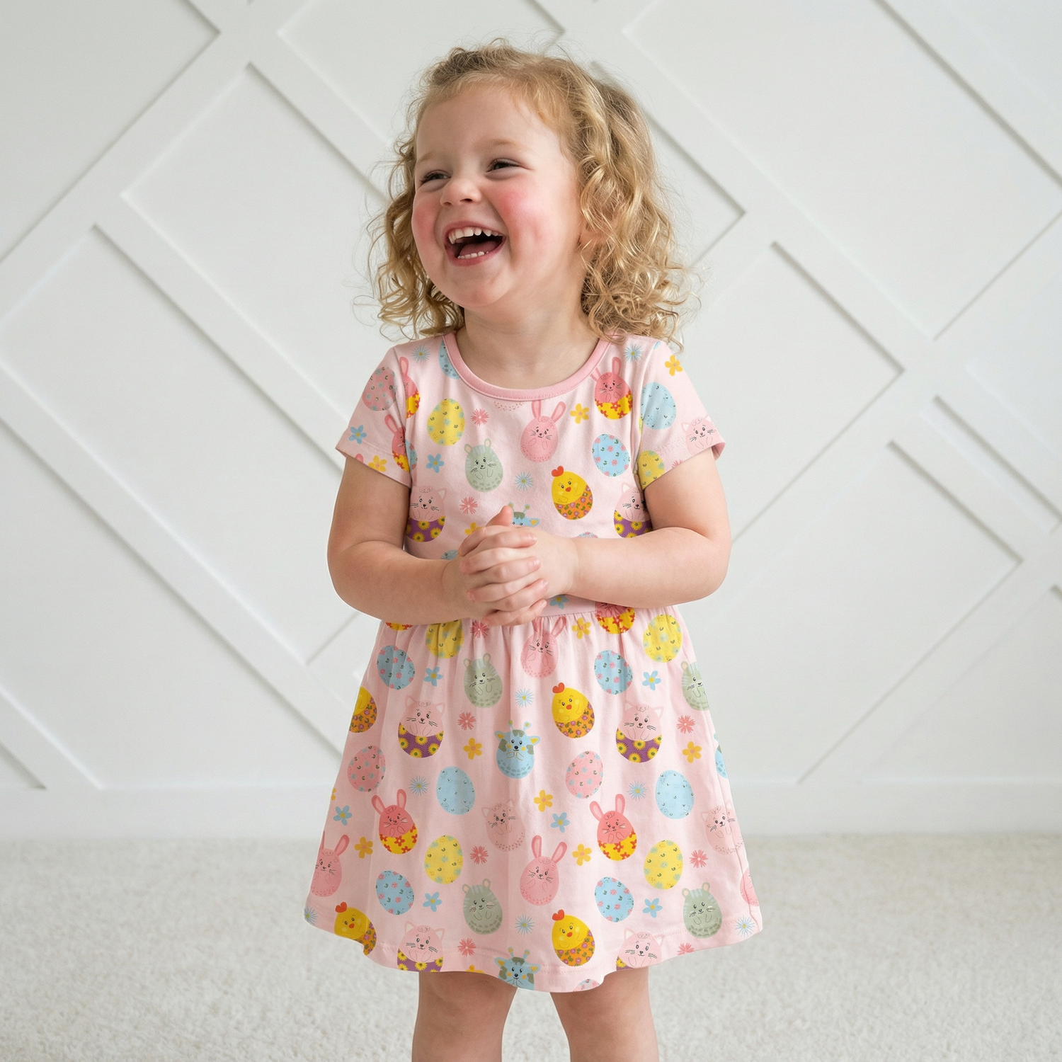 Short sleeve toddler dress in a heart pattern with a relaxed, twirl-ready skirt