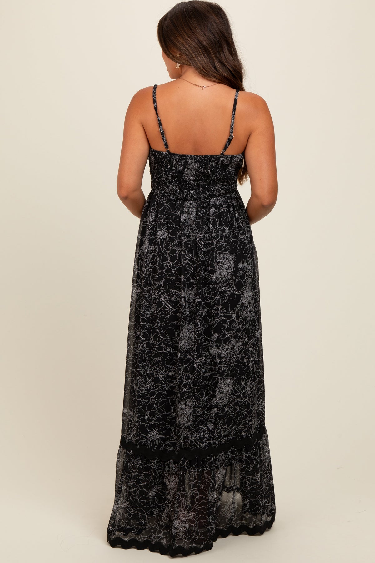PinkBlush Black Floral Contrast Trim Maternity Maxi Dress worn by a pregnant model.