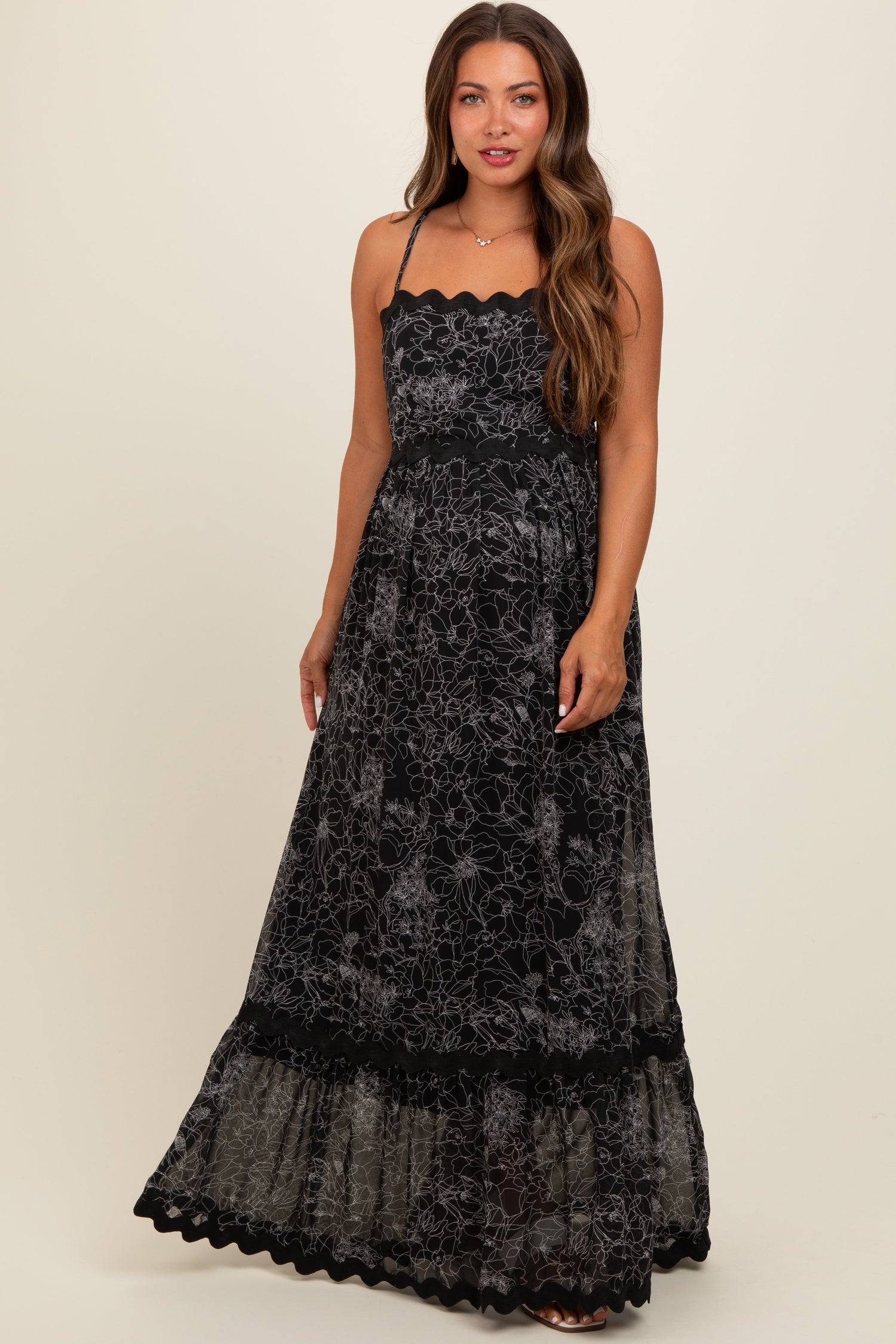 PinkBlush Black Floral Contrast Trim Maternity Maxi Dress worn by a pregnant model.