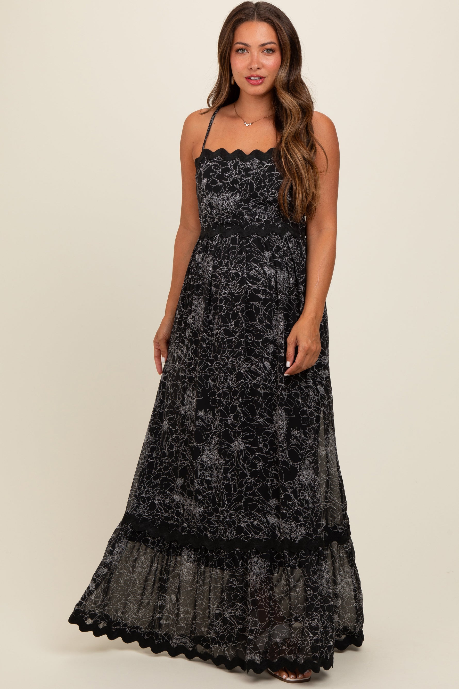 PinkBlush Black Floral Contrast Trim Maternity Maxi Dress worn by a pregnant model.