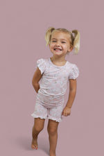 DREAM BIG LITTLE CO EXCLUSIVE DUCKS AND DAISIES DREAM RUFFLE SHORT SETEveretts Place