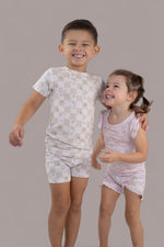 DREAM BIG LITTLE CO EXCLUSIVE DUCKS AND DAISIES DREAM RUFFLE SHORT SETEveretts Place