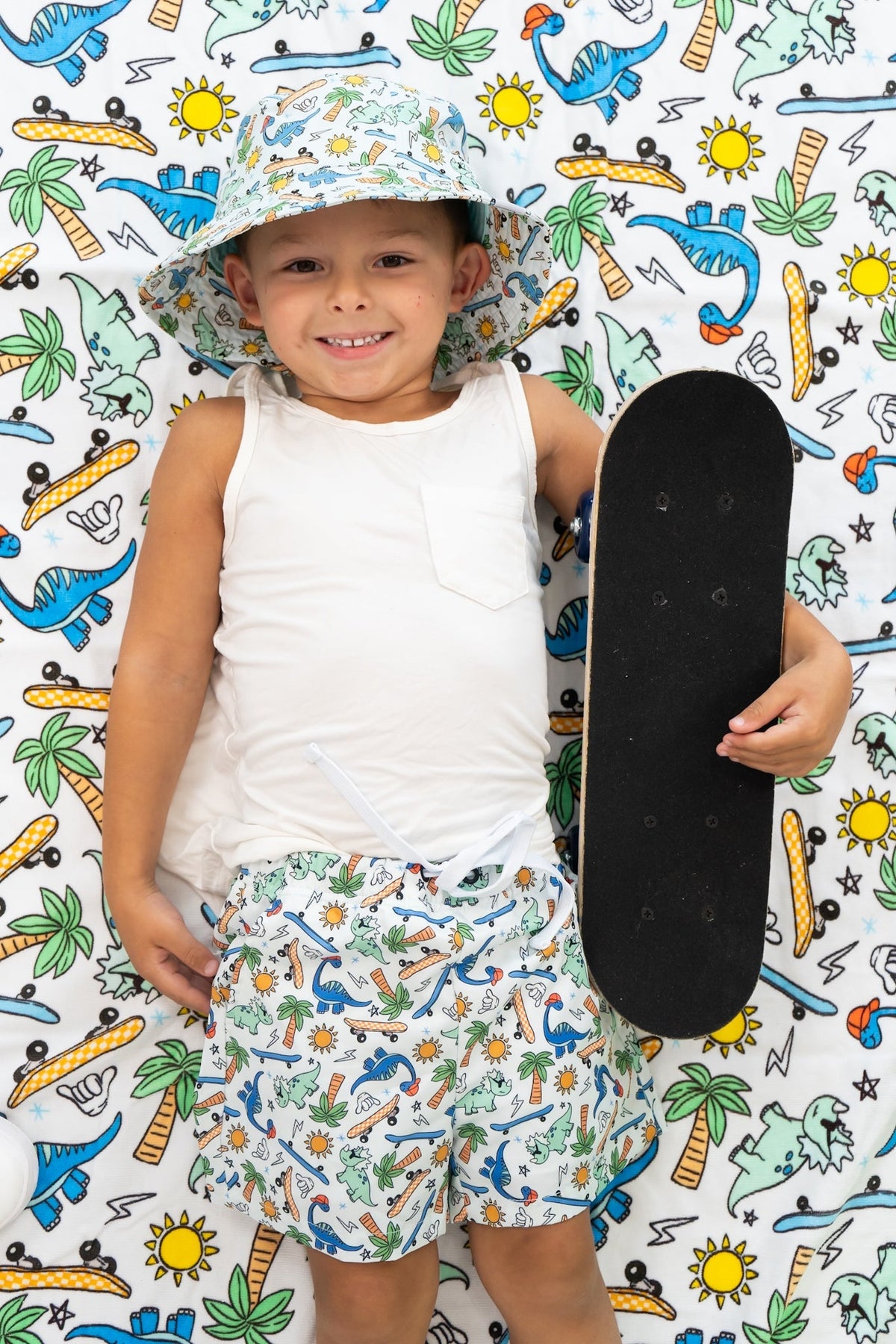 DREAM BIG LITTLE CO EXCLUSIVE SURF - O - SAURUS DREAM SWIM TRUNKSEveretts Place