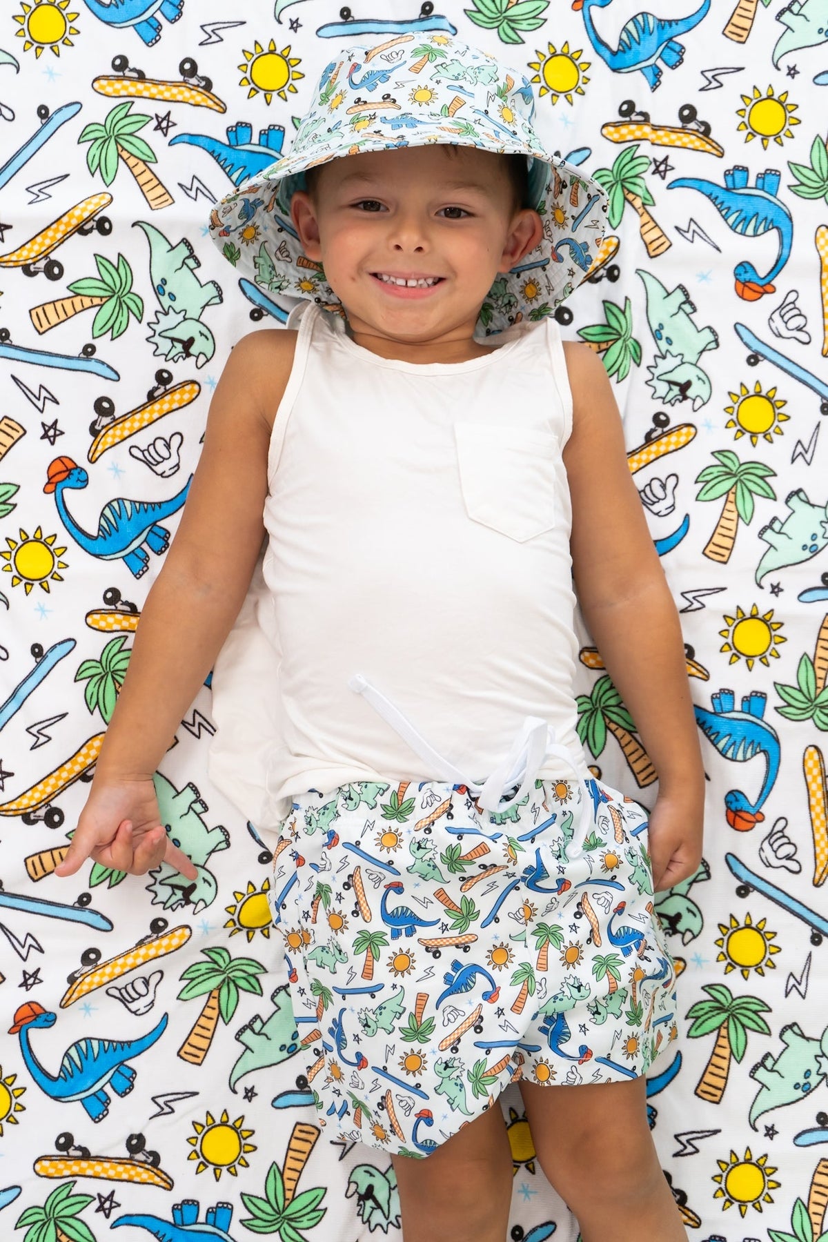 DREAM BIG LITTLE CO EXCLUSIVE SURF - O - SAURUS DREAM SWIM TRUNKSEveretts Place