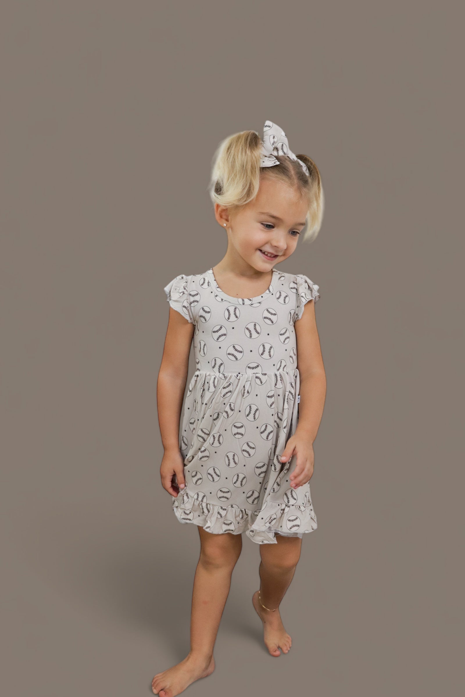 DREAM BIG LITTLE CO EXCLUSIVE SWING FOR THE STARS DREAM CAP SLEEVE RUFFLE DRESSEveretts Place