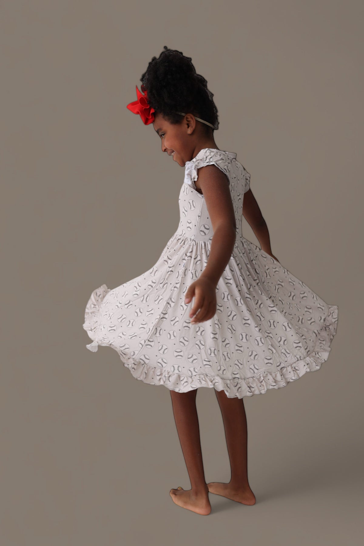 DREAM BIG LITTLE CO EXCLUSIVE SWING FOR THE STARS DREAM CAP SLEEVE RUFFLE DRESSEveretts Place