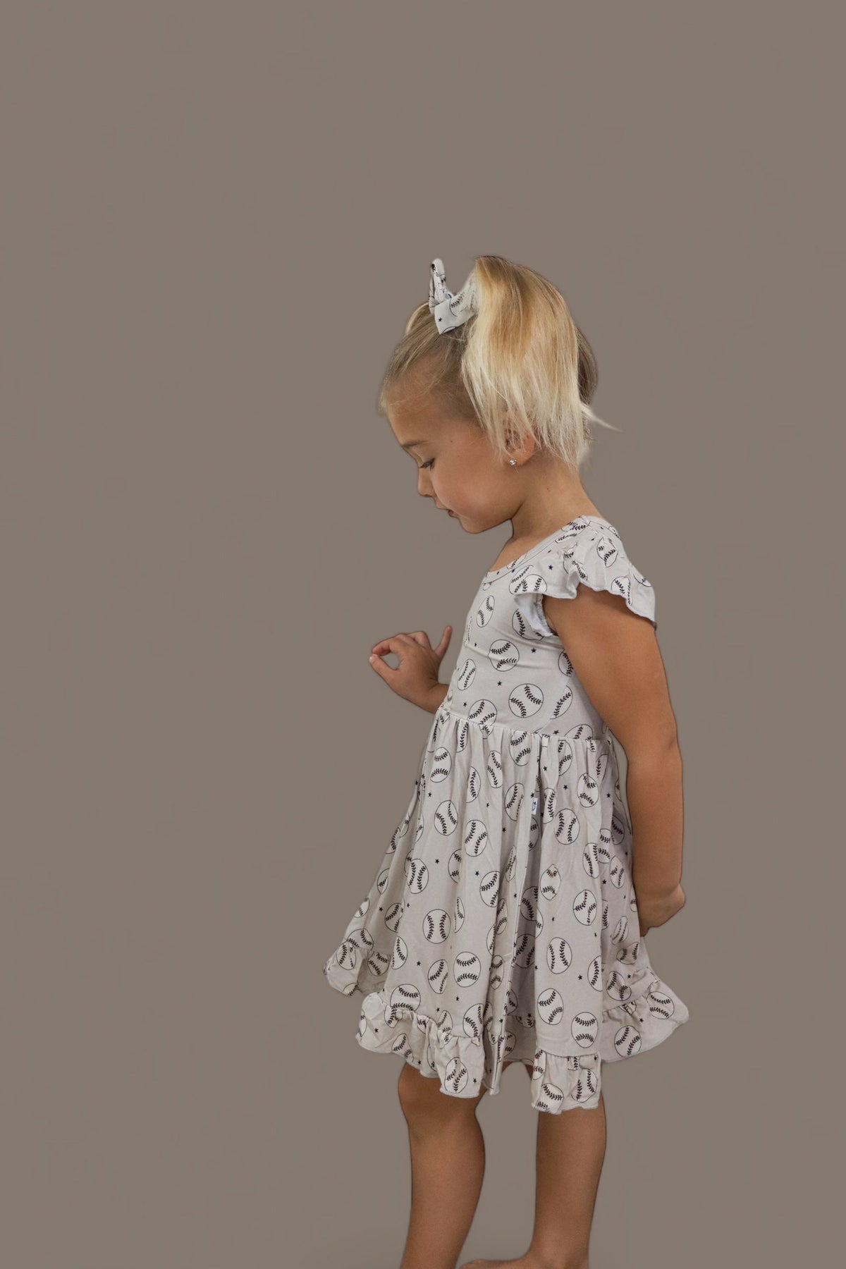 DREAM BIG LITTLE CO EXCLUSIVE SWING FOR THE STARS DREAM CAP SLEEVE RUFFLE DRESSEveretts Place
