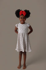 DREAM BIG LITTLE CO EXCLUSIVE SWING FOR THE STARS DREAM CAP SLEEVE RUFFLE DRESSEveretts Place