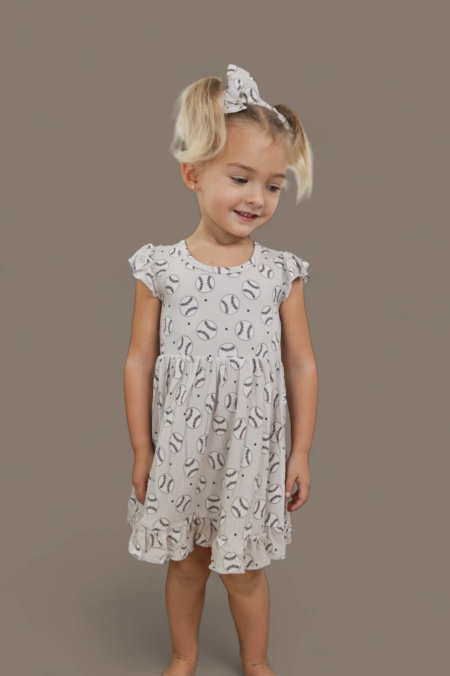 DREAM BIG LITTLE CO EXCLUSIVE SWING FOR THE STARS DREAM CAP SLEEVE RUFFLE DRESSEveretts Place