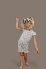 DREAM BIG LITTLE CO EXCLUSIVE SWING FOR THE STARS DREAM RUFFLE SHORT SETEveretts Place