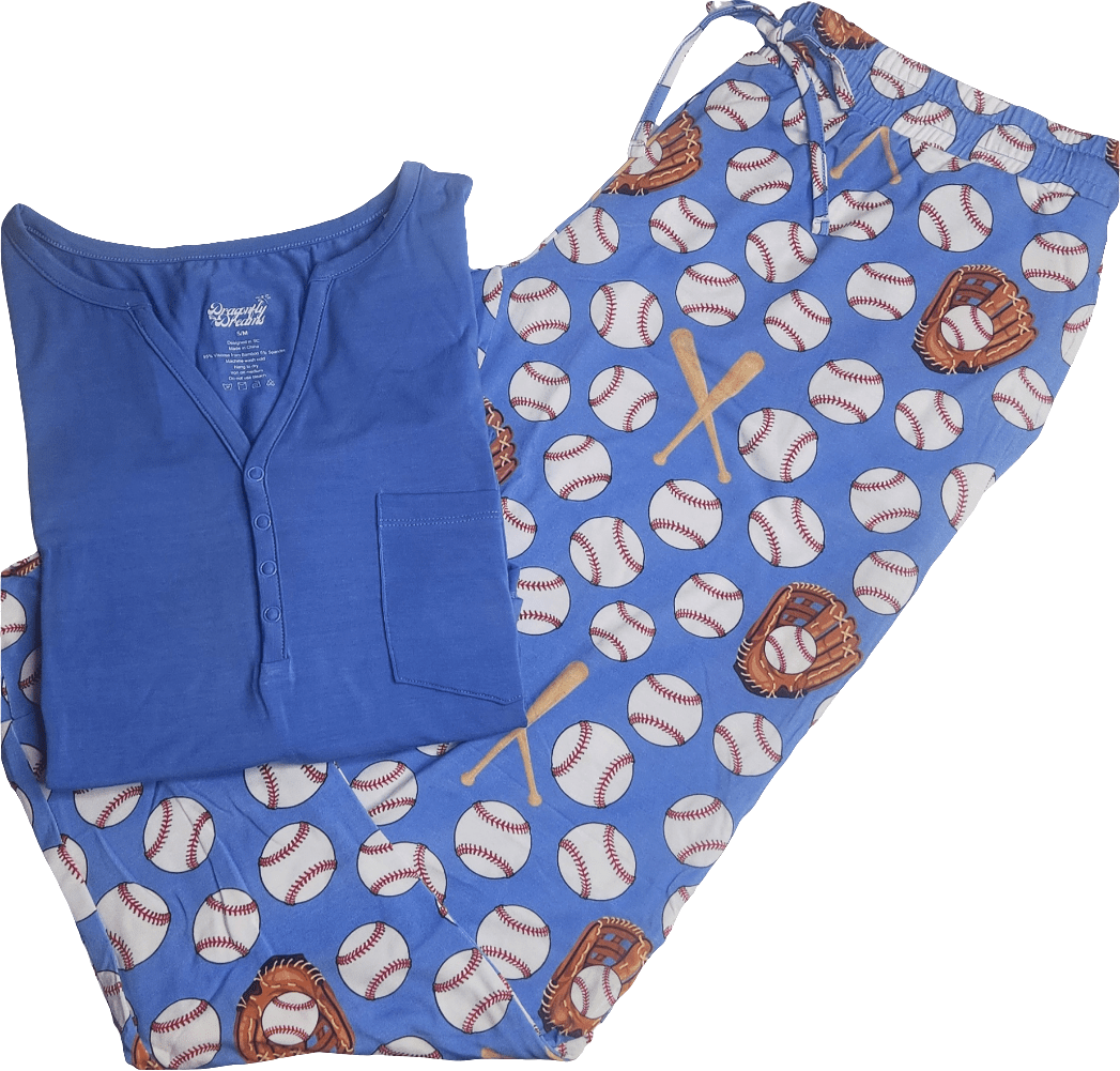 Women's short-sleeve pajama top with buttons and matching long jogger pants in an eye-on-the-ball print.