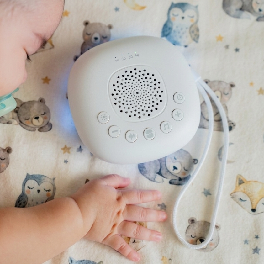 Sleeping Pal portable sound machine with night light and timer for babies.