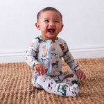 Baby footie pajamas with a farm-themed print, full-length zipper, and covered feet