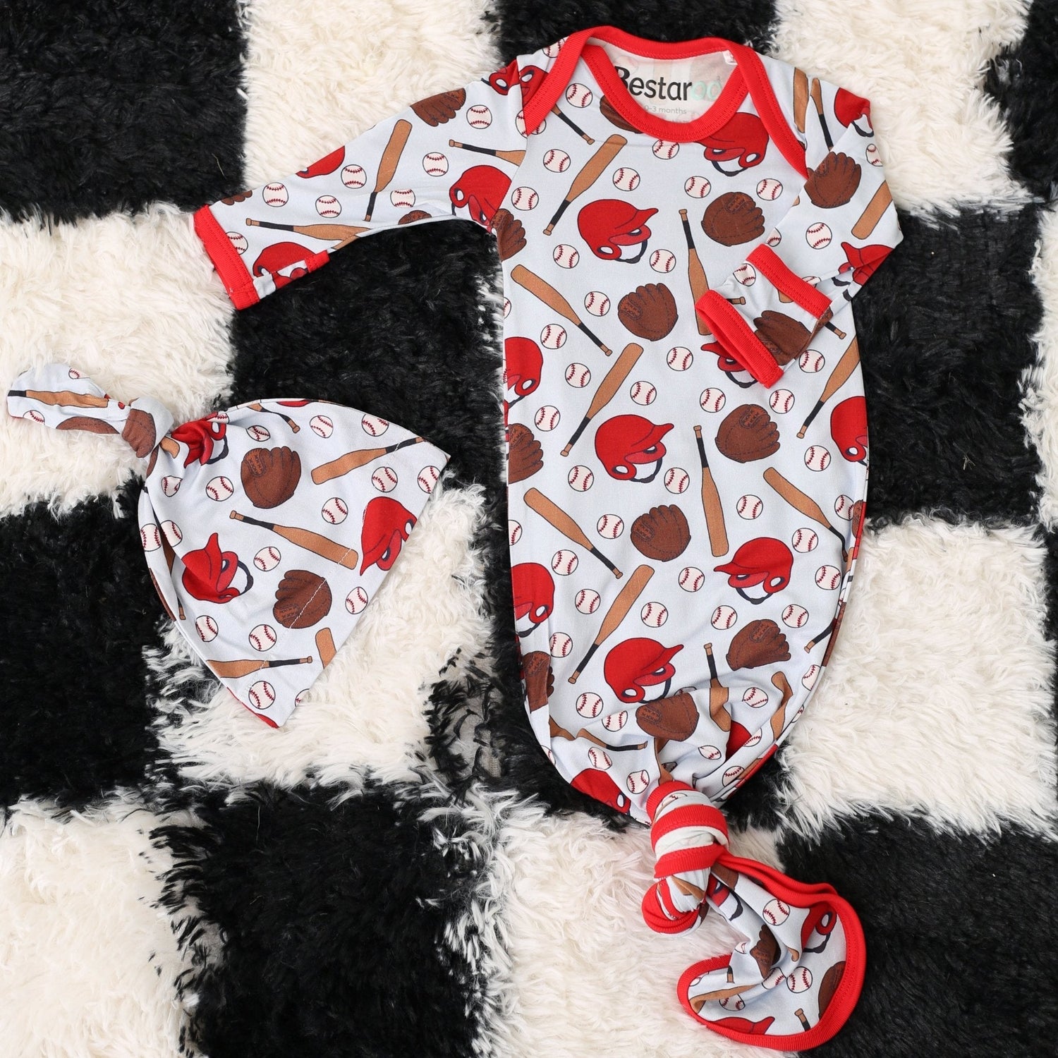 Baby gown and matching hat in a baseball fastball print with fold-over mittens and knotted bottom