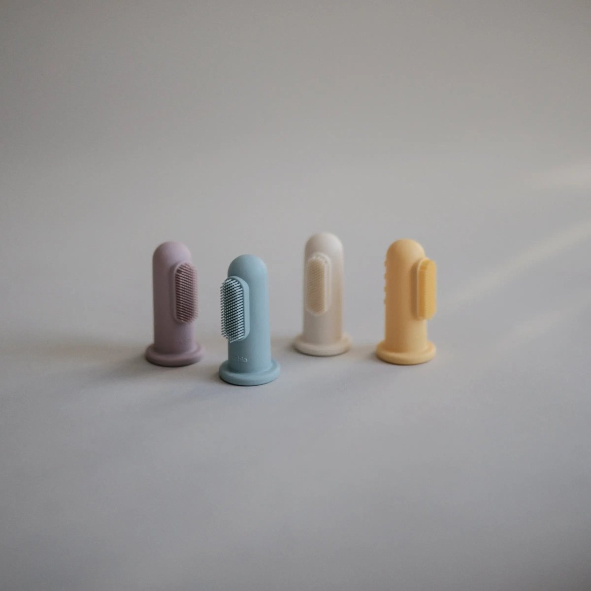 Mushie Finger Toothbrush for Babies BPA Free and Chemical Free Food Grade Silicone - Everetts Place Boutique - 