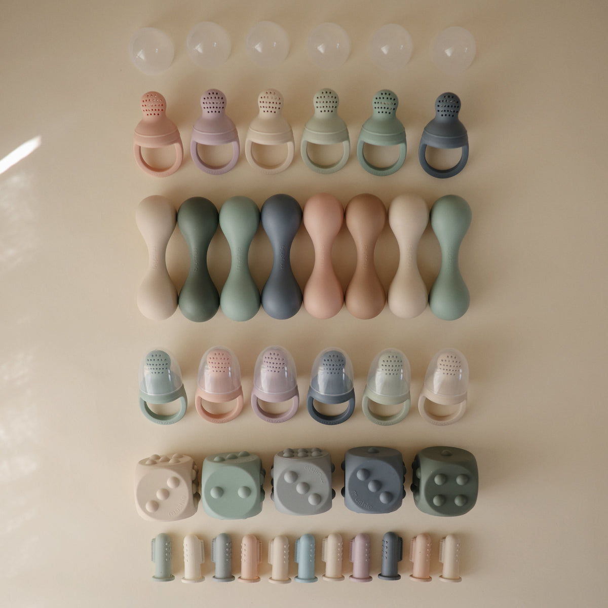 Silicone Baby Rattle Toy by Mushie