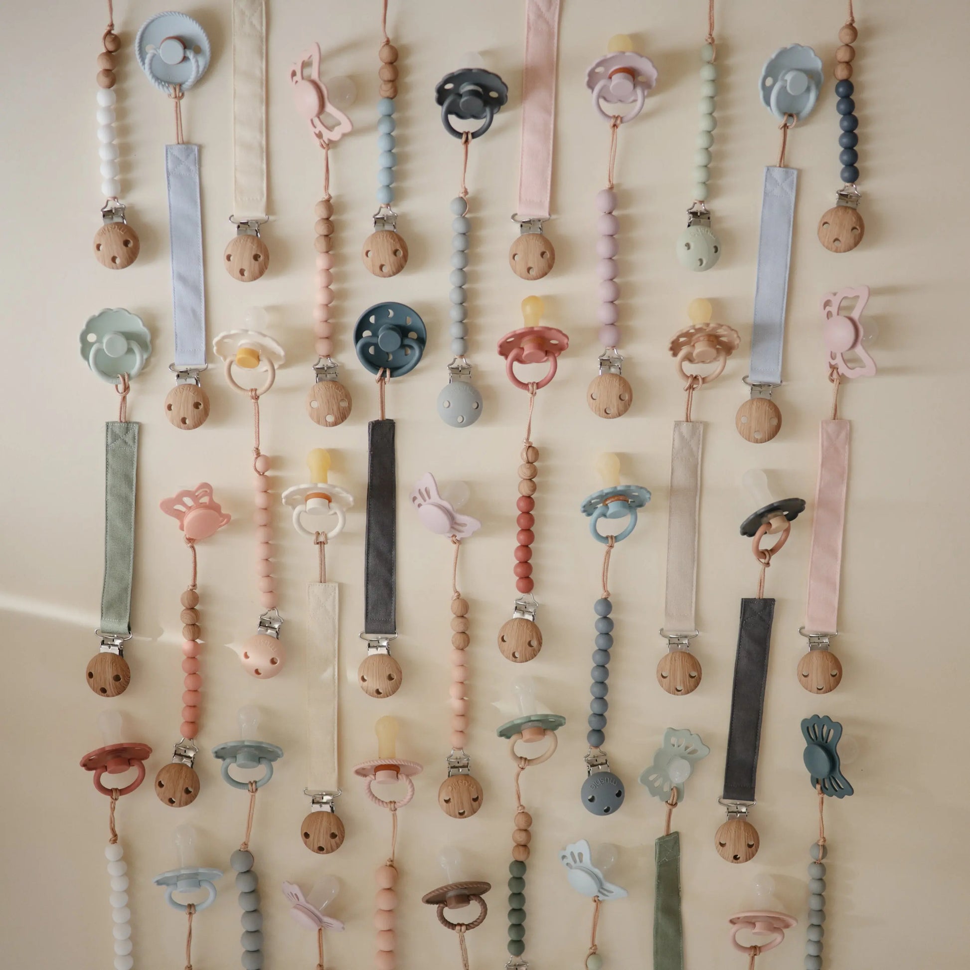 Linen Pacifier Clip Two Pack with Water Resistant Coating and Faux Wood Silicone Clasp Mushie